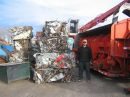 Cubed metal bales ready for direct charge or shredding